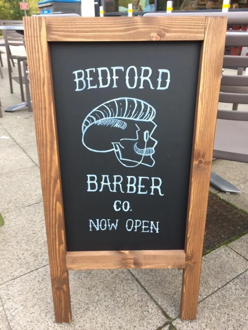 Loving the new pavement sign 🙌🏽this way for a fresh trim 👉🏽💈